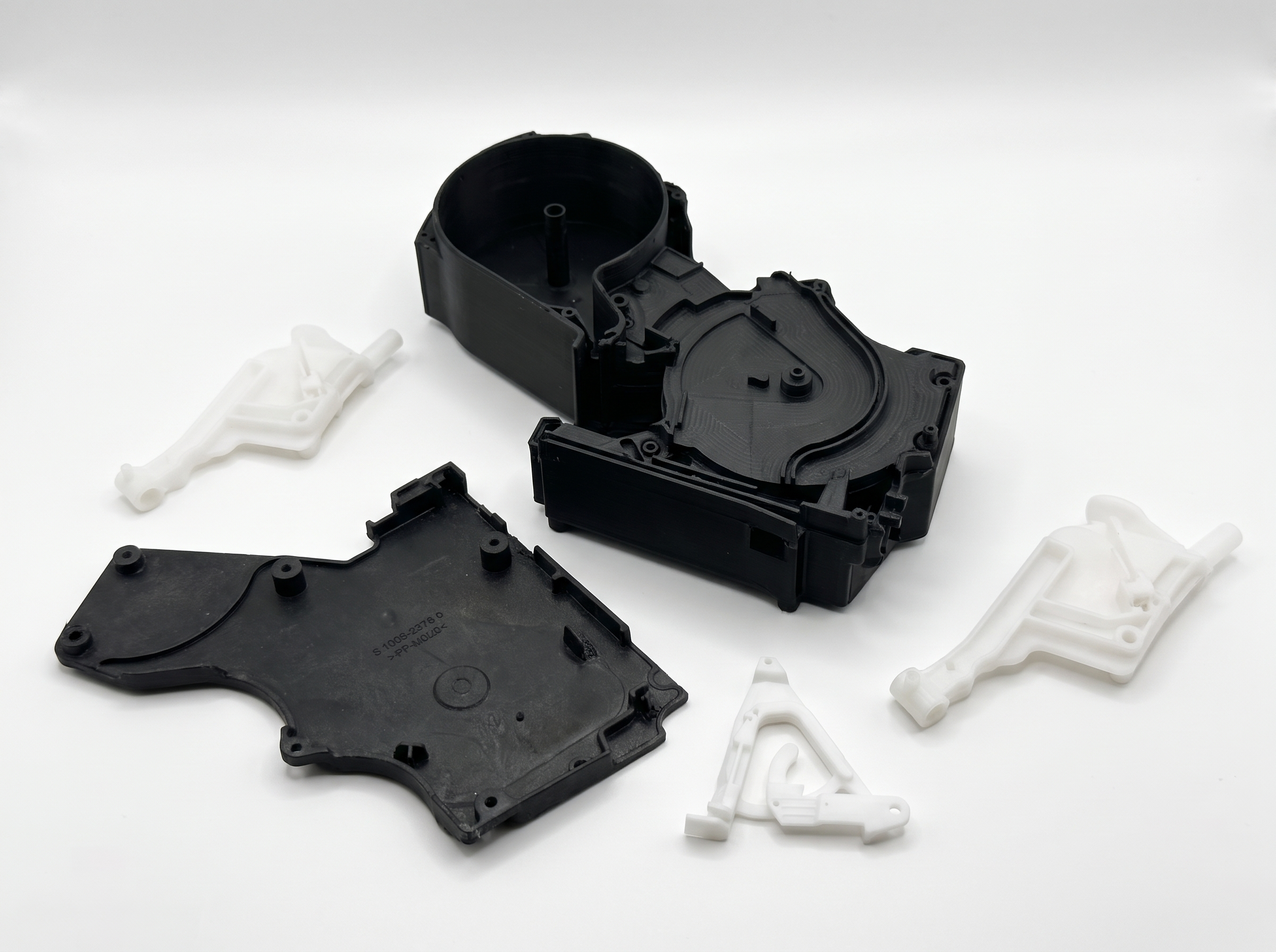 5-axis milled plastic prototype parts in black PP and white POM
